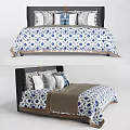 Double Bed With Blue White Floral Bedding Multiple Pillows And Gray Runner 3d model
