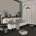 Large Beige Sofa With Throw Pillows Blanket And Decorative Paintings In Cozy Living Room