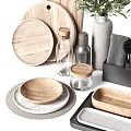Modern Kitchenware Collection Featuring Wooden Cutting Boards Glass Jars Metal Bottles and Bowls