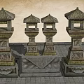 Traditional Stone Lanterns with Carved Bases and Ornate Roofs as Garden Ornaments on Paved Ground