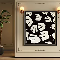 Black and White Leaf Oil Painting Hanging on Wall with Wall Sconces and Potted Plant