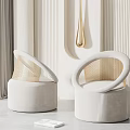 Modern Minimalist Single Sofa With Round Woven Armrest And Beige Velvet In Interior Design