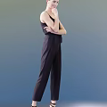 Stylish Woman In Black Sleeveless Jumpsuit Standing With Crossed Arms Against Gradient Blue Backdrop