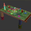 Wooden Table With Green Tabletop And Colorful Models Pink Tower Yellow Castle And Green Figure