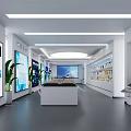 Modern Open Office Showroom With Large Screens Green Plants And Display Counters