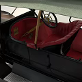 Vintage Classic Car With Soft Top Red Seats And Gold Front Grille