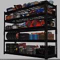 Heavy Duty Shelving Unit With Stacked Tires Red Drums Toolboxes Storage Cans And Tools