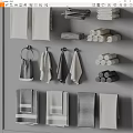 Gray And White Towels Featuring Hanging And Rolled Styles Arranged On Wall