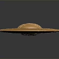 Golden Circular Textured Object with Raised Center and Metallic Surface on Dark Background