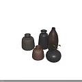 Artisanal Ceramic Vessels With Earth Tones Various Shapes And Textured Surfaces