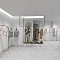 Modern Clothing Store Interior Design With Mannequins Clothing Racks And Green Plants