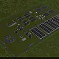 Industrial Factory Layout With Circular Storage Tanks Blue Roof Buildings And Green Trees