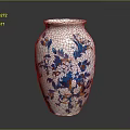 White Ceramic Vase Decorated With Blue And Orange Floral Patterns For Home Decor
