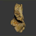 Yellow Irregular Shaped Stone With Textured Surface And Reflection On Dark Background