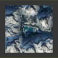 Blue And White Rugged Mountainous Terrain With Snow Covered Peaks And Glacial Features