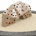 Playground Climbing Equipment With Geometric Shapes And Grip Holds In Sand