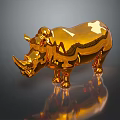 Highly Shiny Golden Rhinoceros Statue With Clear Reflection On Dark Background