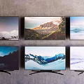 Multiple Televisions Showcasing Scenic Natural Landscapes With Mountain And Starry Sky Views