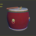 Red Musical Drum Featuring Golden Decorative Rings And Wooden Drumsticks On Surface