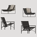 Modern Lounge Chairs With Black Metal Frame Light Blanket And Minimal Design