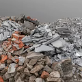 Large Pile of Construction Debris Including Rubble Bricks and Concrete Fragments