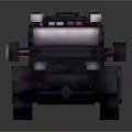 Pixel Art Military Vehicle Dark Colored Body with Large Tires and Roof Equipment