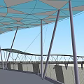 Modern Bridge With Blue Roof Structure Supporting Pillars And Mesh Fences