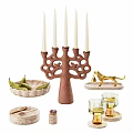 Elegant Tea Set Featuring Tree Shaped Candelabra Pear Filled Plate and Golden Lion Figurine