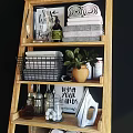 Multi Tiered Wooden Shelf Unit With Potted Plants Baskets Glass Bottles And Decorative Items
