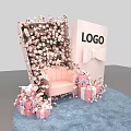Floral Decoration Setup With Pink Floral Wall Sofa Gift Boxes And Bow Background Board