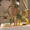 Banquet Hall Interior With Hexagon Floral Arch Yellow Chairs And White Table Skirt