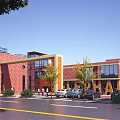 Modern School Building With Red Brick Exterior Large Glass Windows Yellow Accents And Surrounding Trees