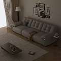 Cream Colored Leather Three Seater Sofa with Throw Blanket and Wall Art in Living Room