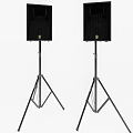 Two Black Speakers Mounted On Tripod Stands For Event Sound Setup