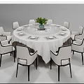 Modern Round Dining Table Set With White Tablecloth Green Plant And Eight White Chairs