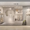 Modern Clothing Store Interior With Garment Racks Display Shelves Chandelier Potted Plant And Marble Walls