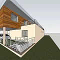 Modern Single Family Home With Wooden Exterior Balcony Metal Railing Patio And Lawn