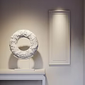 Circular Sculpture Carving With Intricate Patterns On Stand And Framed Painting