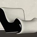 Modern Leisure Chair With Black And White Leather And Unique Curved Sleek Design