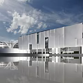 Modern White Sales Office Building With Glass Windows And Water Reflection Under Blue Sky