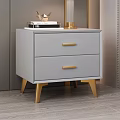 Modern Gray Bedside Table With Two Drawers Gold Handles And Table Lamp On Top
