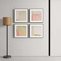 Four Abstract Paintings In Black Frames On White Wall With Colorful Patterns 3d model