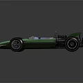 Vintage Green Single Seater Racing Car With Large Wheels And Rear Wing