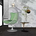 Transparent Spherical Hanging Chair With Green Cushion White Base And Marble Wall
