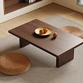 Modern Wooden Tea Table And Woven Stools Interior With Golden Tray And Area Rug