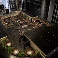 Outdoor Terrace Restaurant With City Night View String Lights And Green Plants