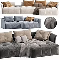 Modern Tufted Sectional Sofa With Multiple Pillows And Warm Blanket In Neutral Blue Tones 3d model