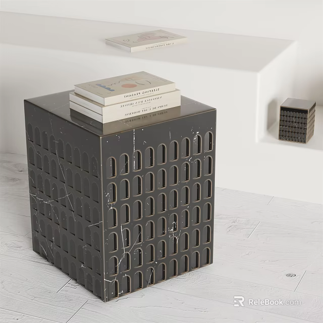 Modern Black Marble Side Table With Perforated Design And Stacked Books On Top 3d model 