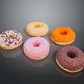 Colorful Donuts With Various Frosting And Sprinkles On Black Sleek Surface