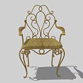 Ornate Wrought Iron Armchair With Curved Arms Gold Frame And Patterned Upholstery